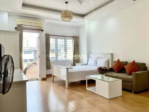 Studio Apartment with Balcony for Rent at Smiley Apartment District 1