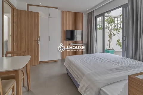 Rooftop studio apartment with balcony at Minh's Serviced Apartments