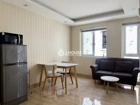 Affordable Studio Apartment with Washer at TH Apartment District 3
